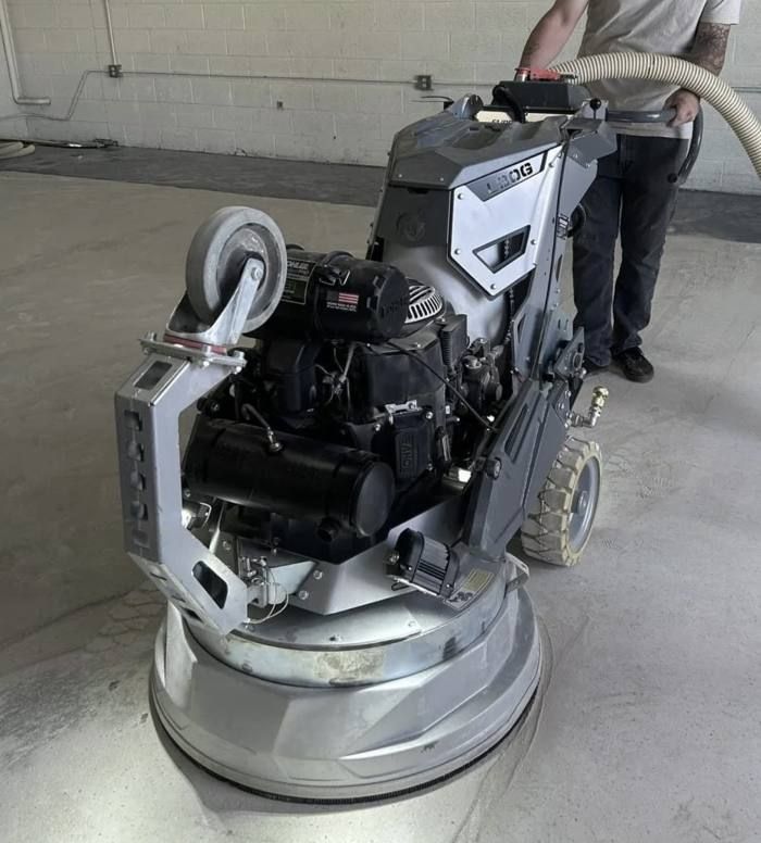 Diamond grinder prepping a concrete floor